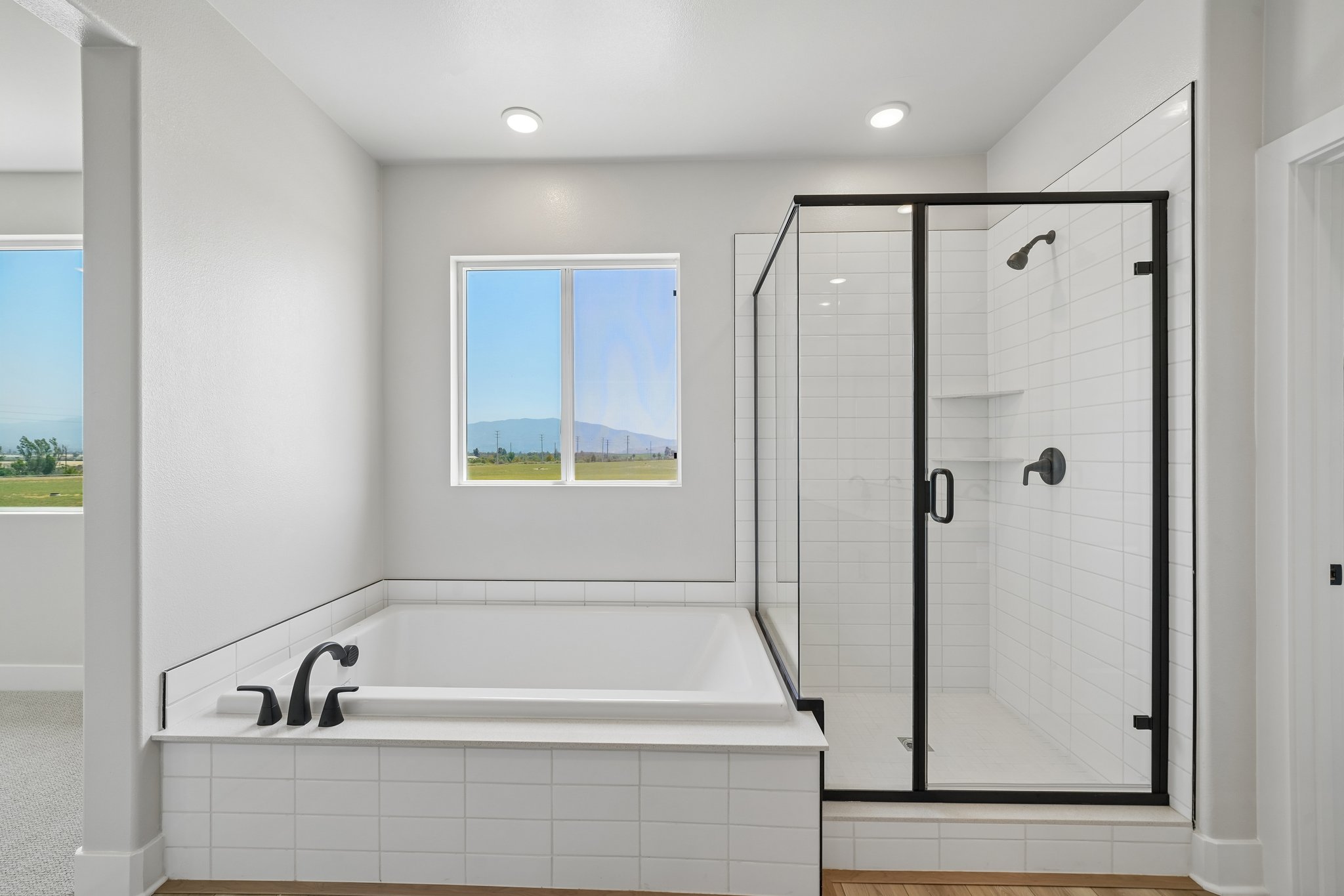 A bathroom with a glass shower.