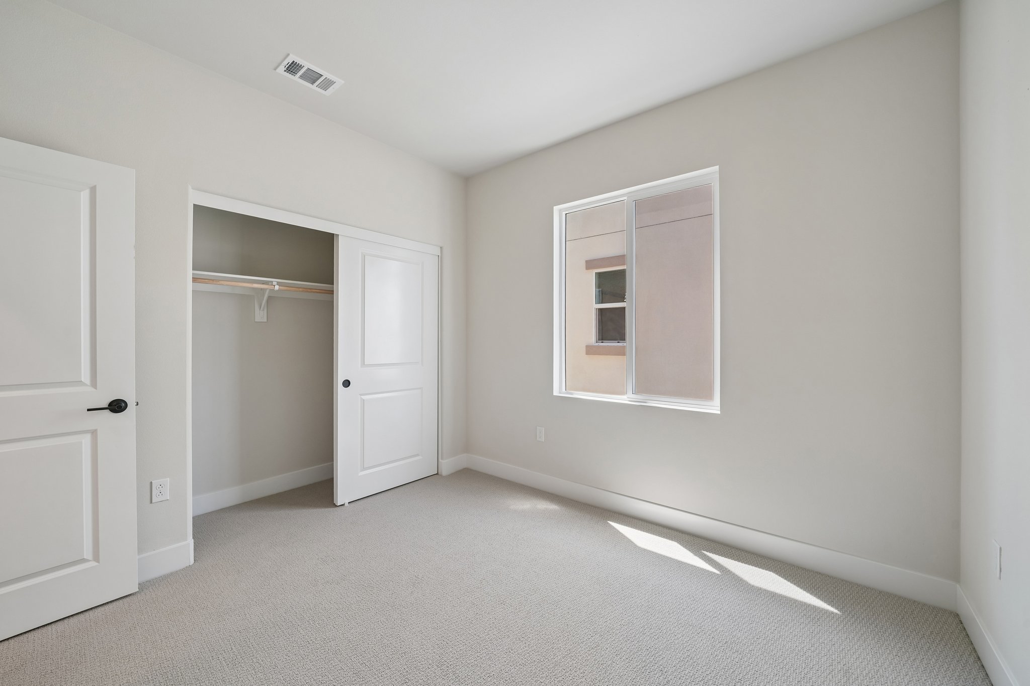A room with white doors.