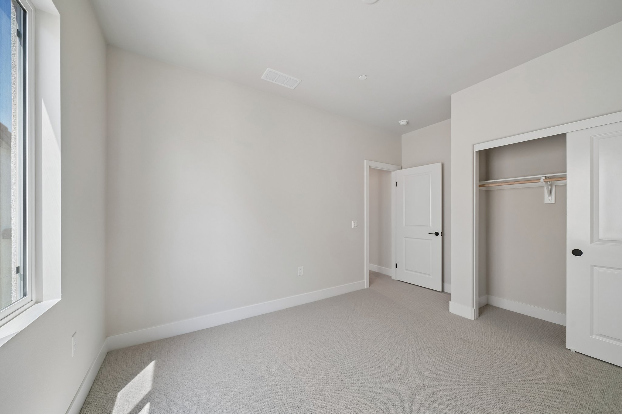 A room with white doors.