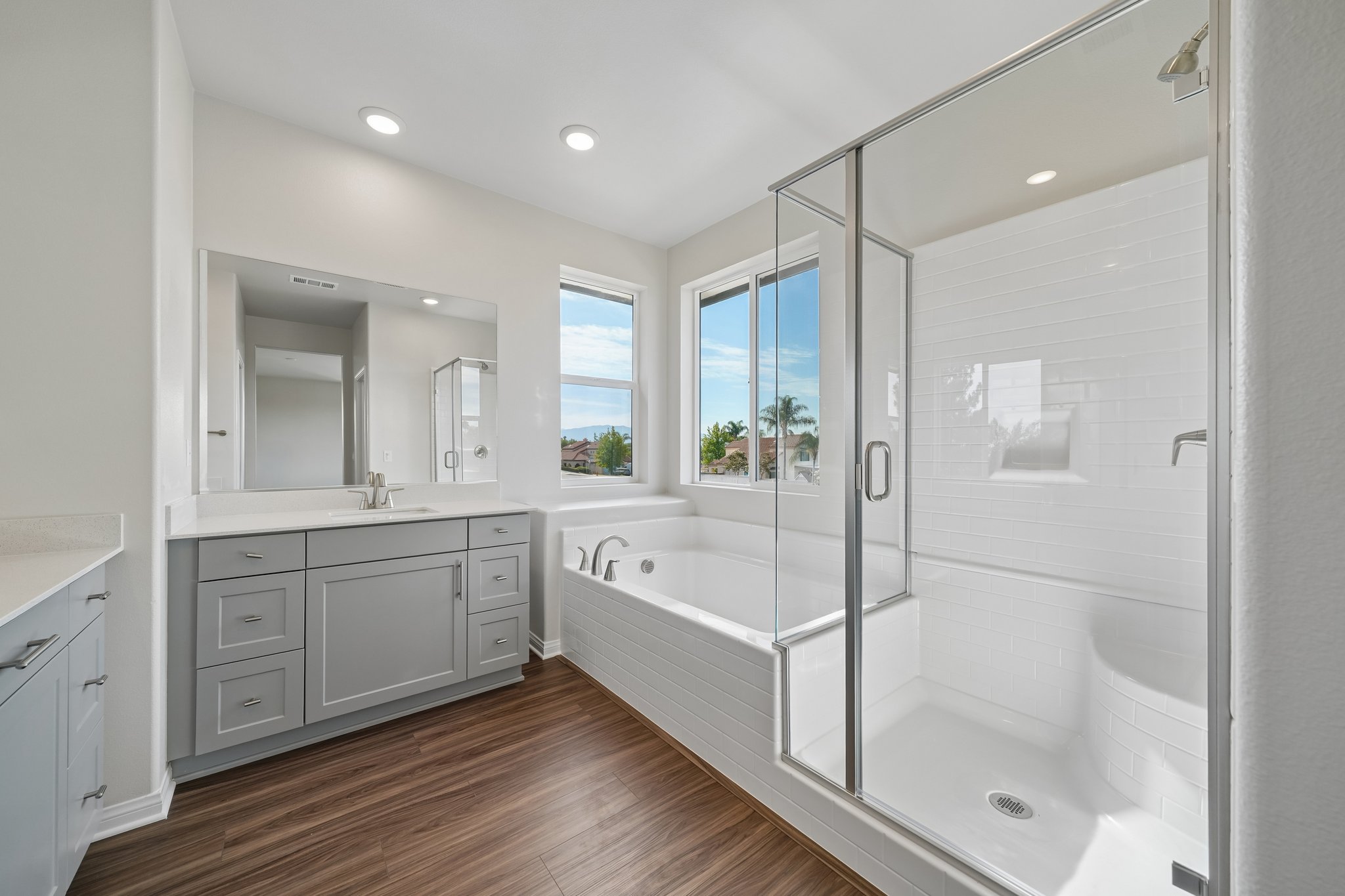 A bathroom with a glass shower.
