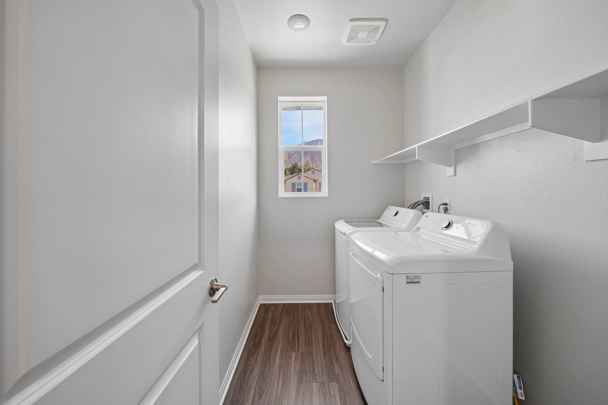 A bathroom with a sink and a cabinet.