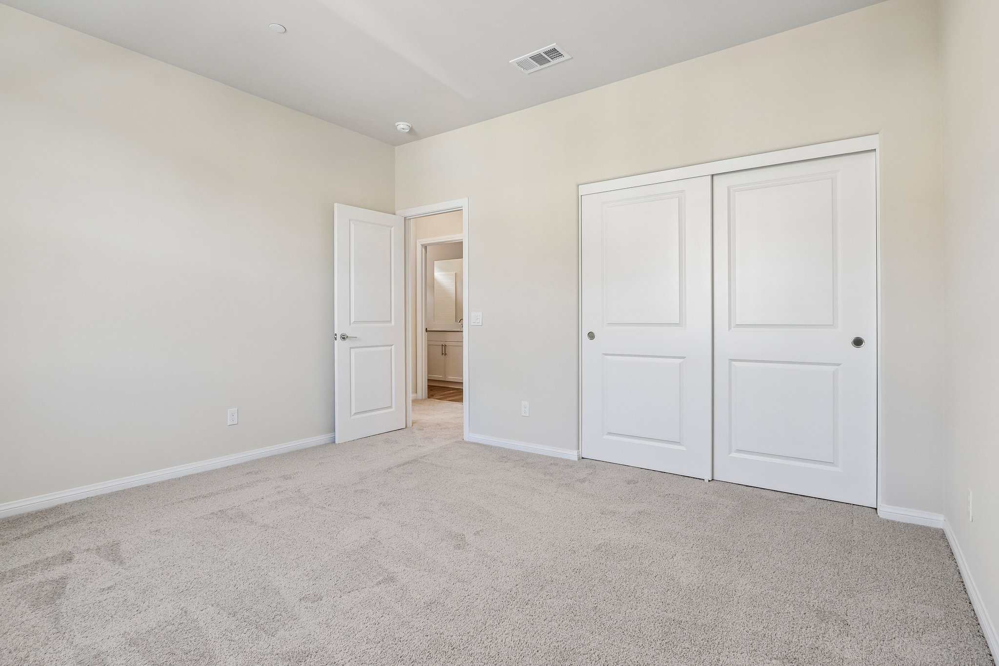 A room with white doors.