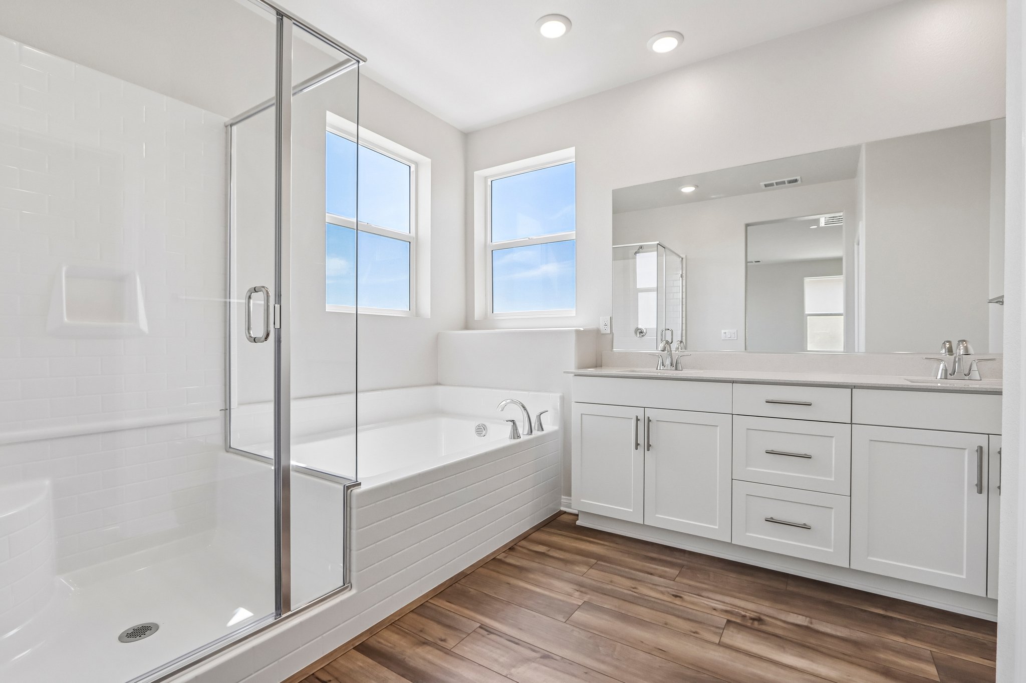 A bathroom with a glass shower.