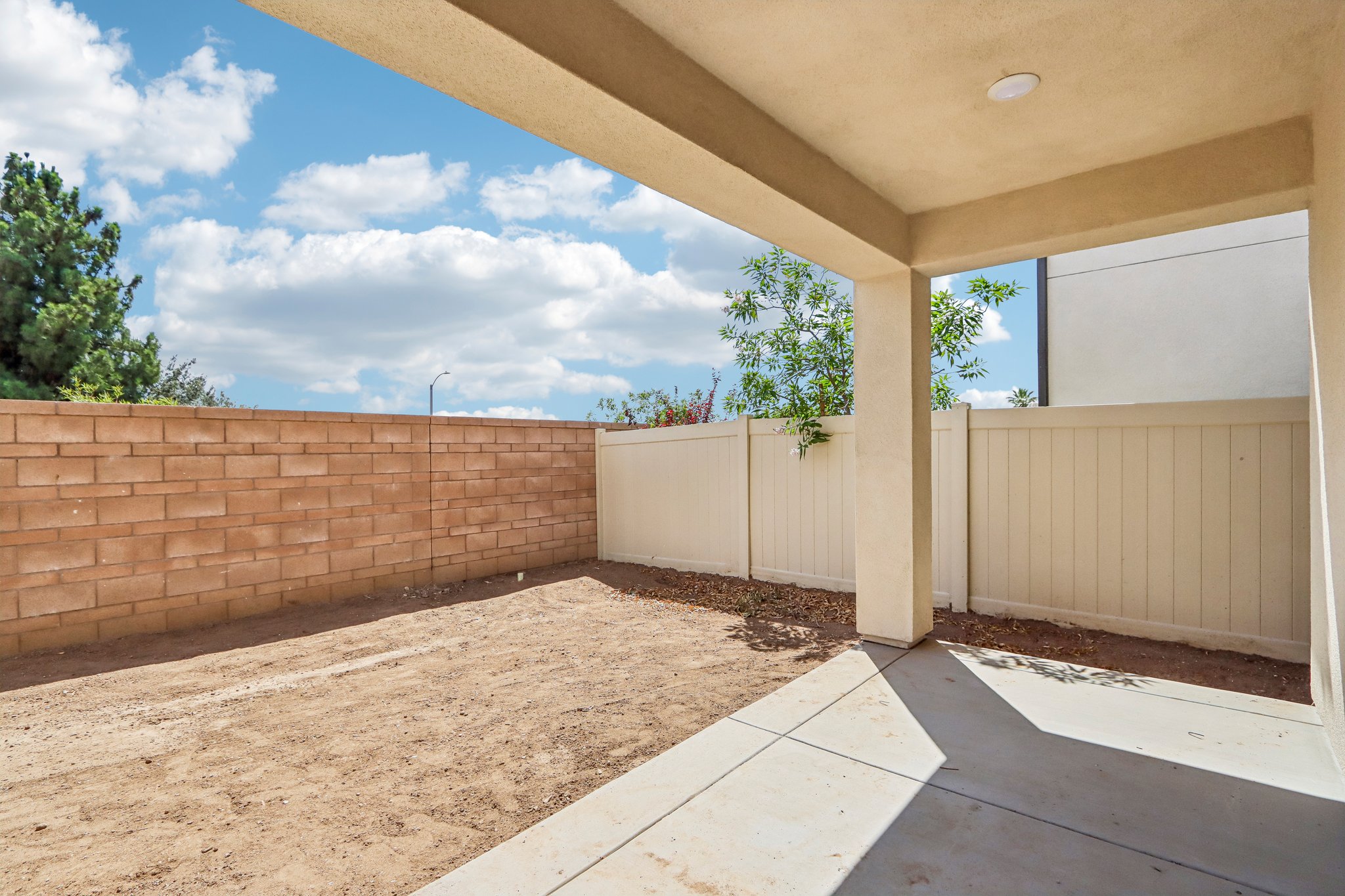 A garage with a fence.