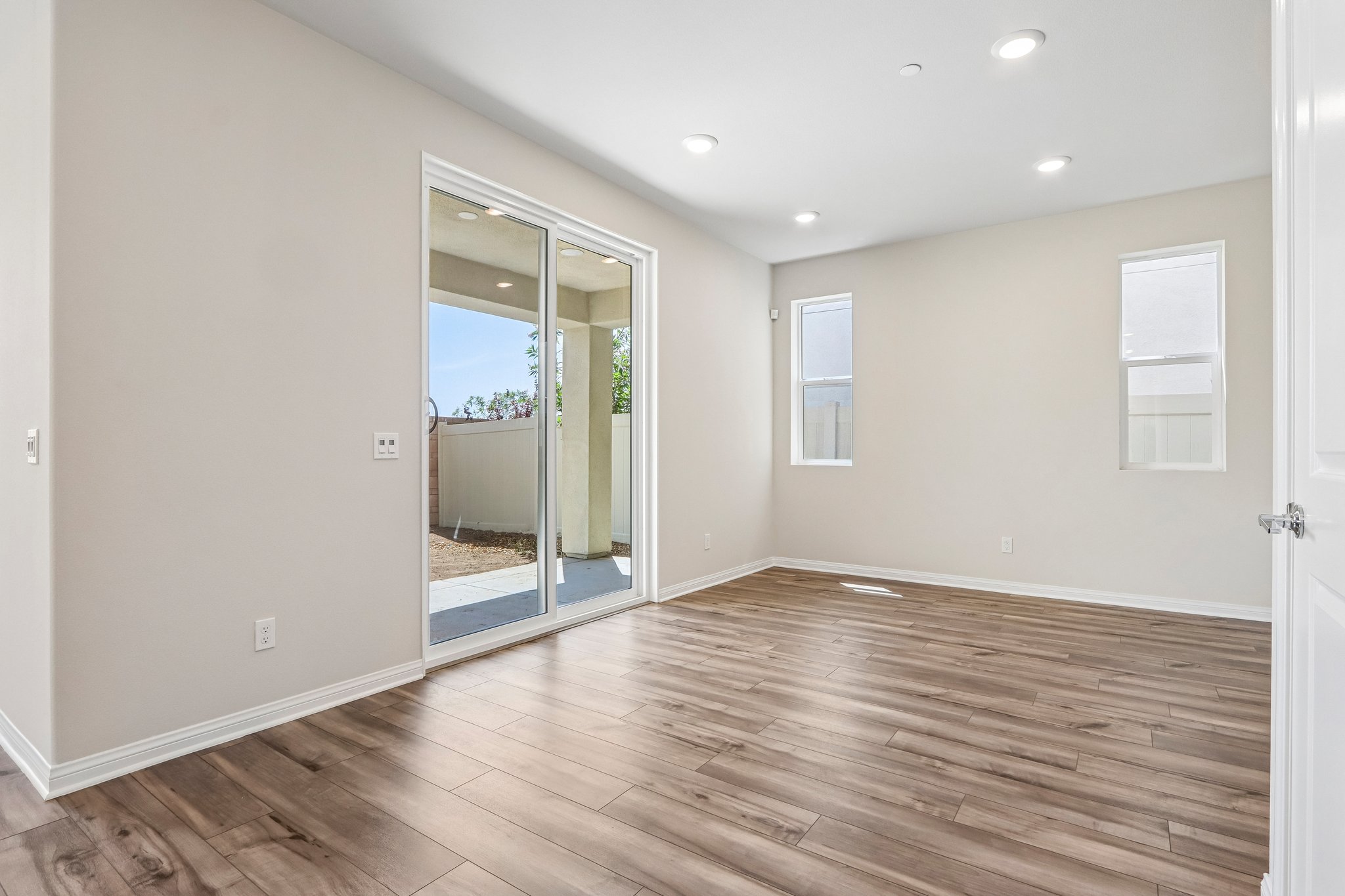 A room with a glass door.