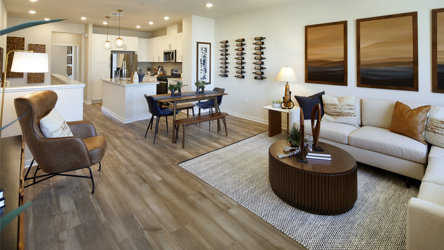 A living room with a wood floor.