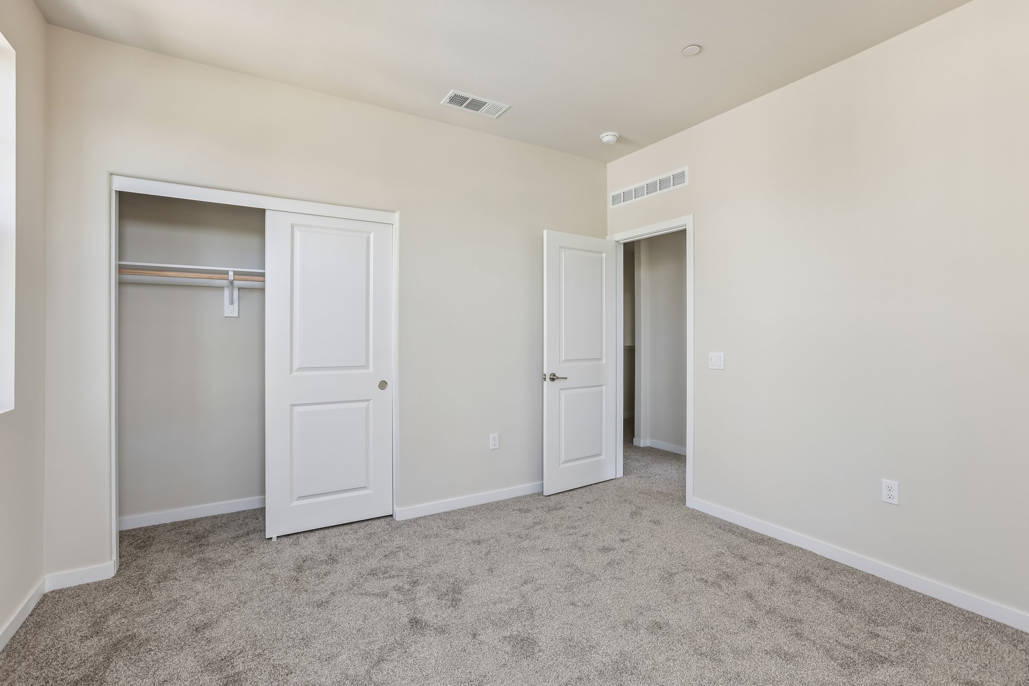 A room with white doors.