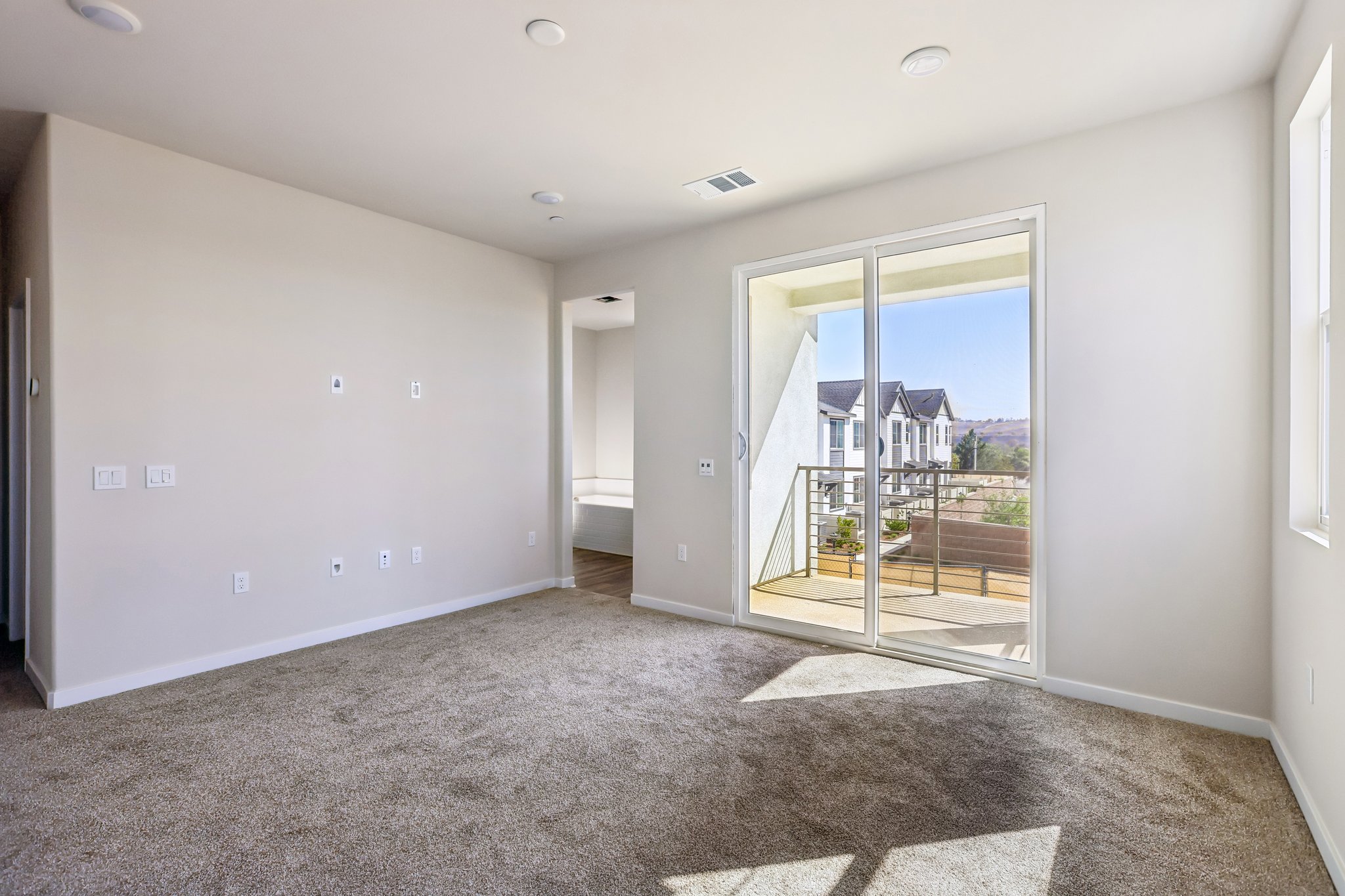 A room with a glass door.