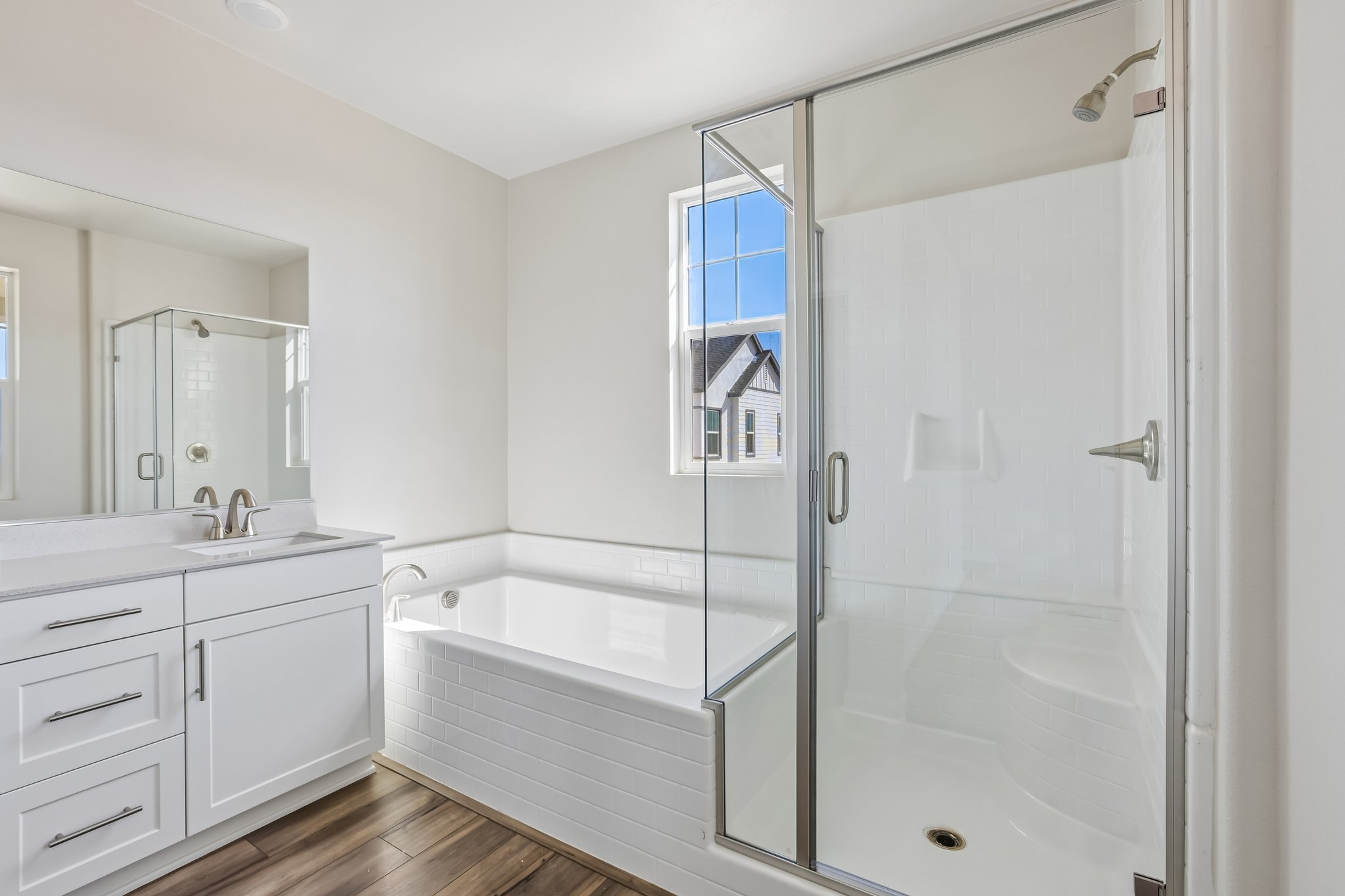 A bathroom with a glass shower.