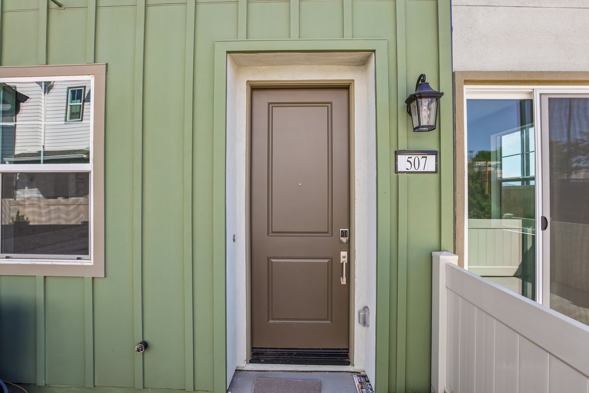 A door with a light above it.