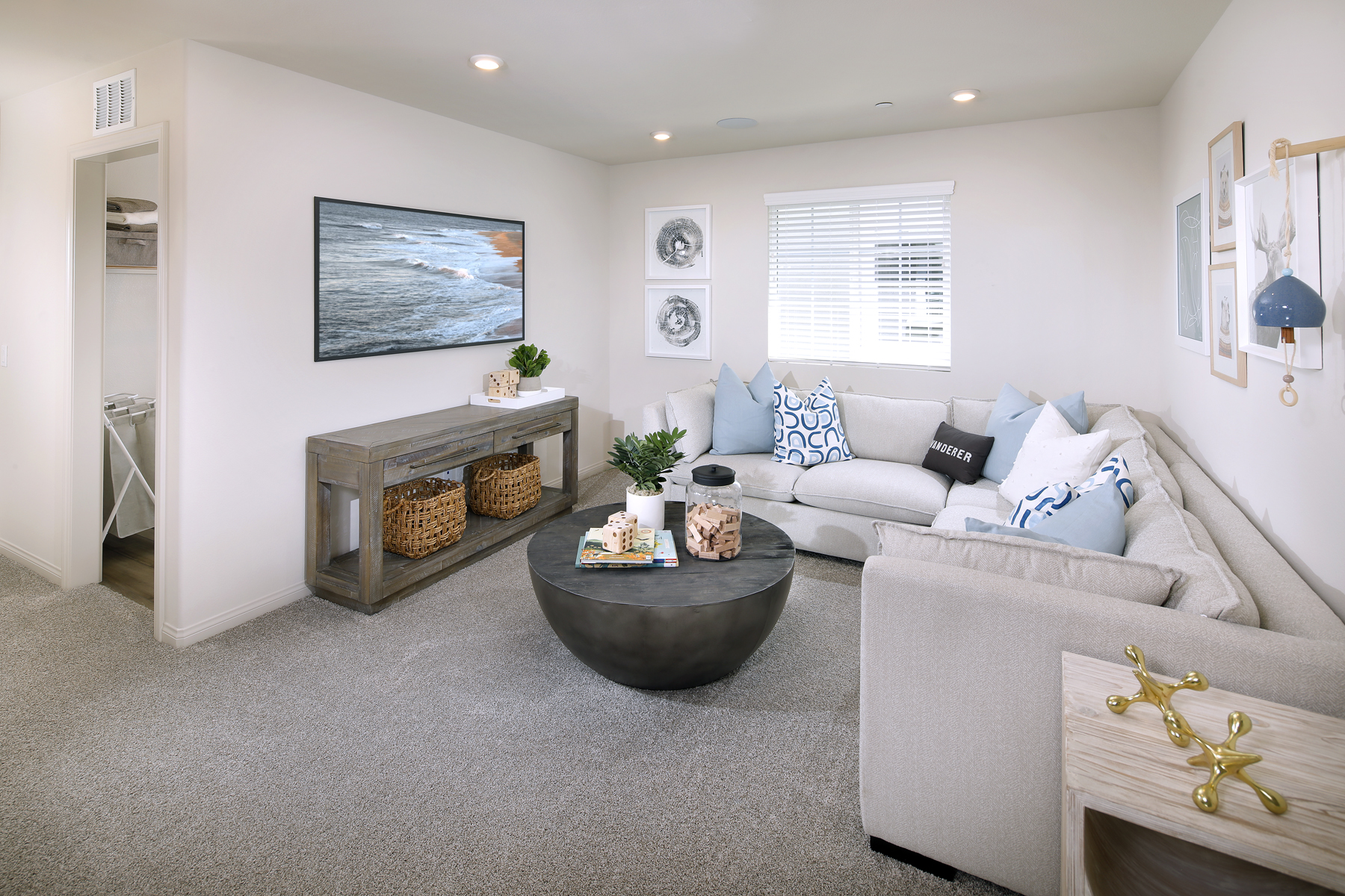 A living room with a couch and a coffee table.