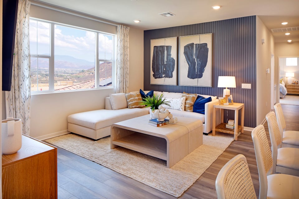 A living room with a large window.