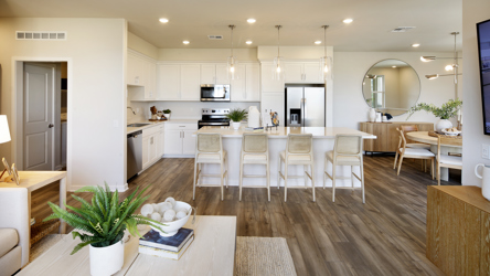 A large kitchen with white cabinets.