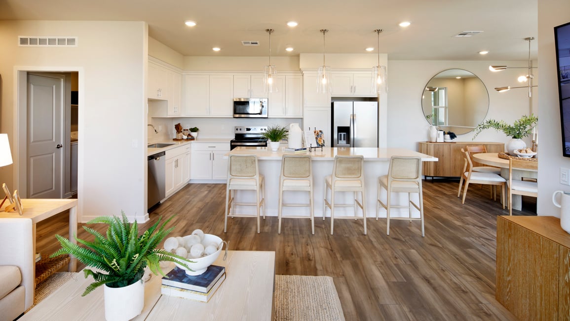 A large kitchen with white cabinets.