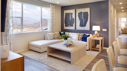 A living room with a large window.