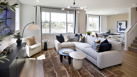 A living room with a large window.