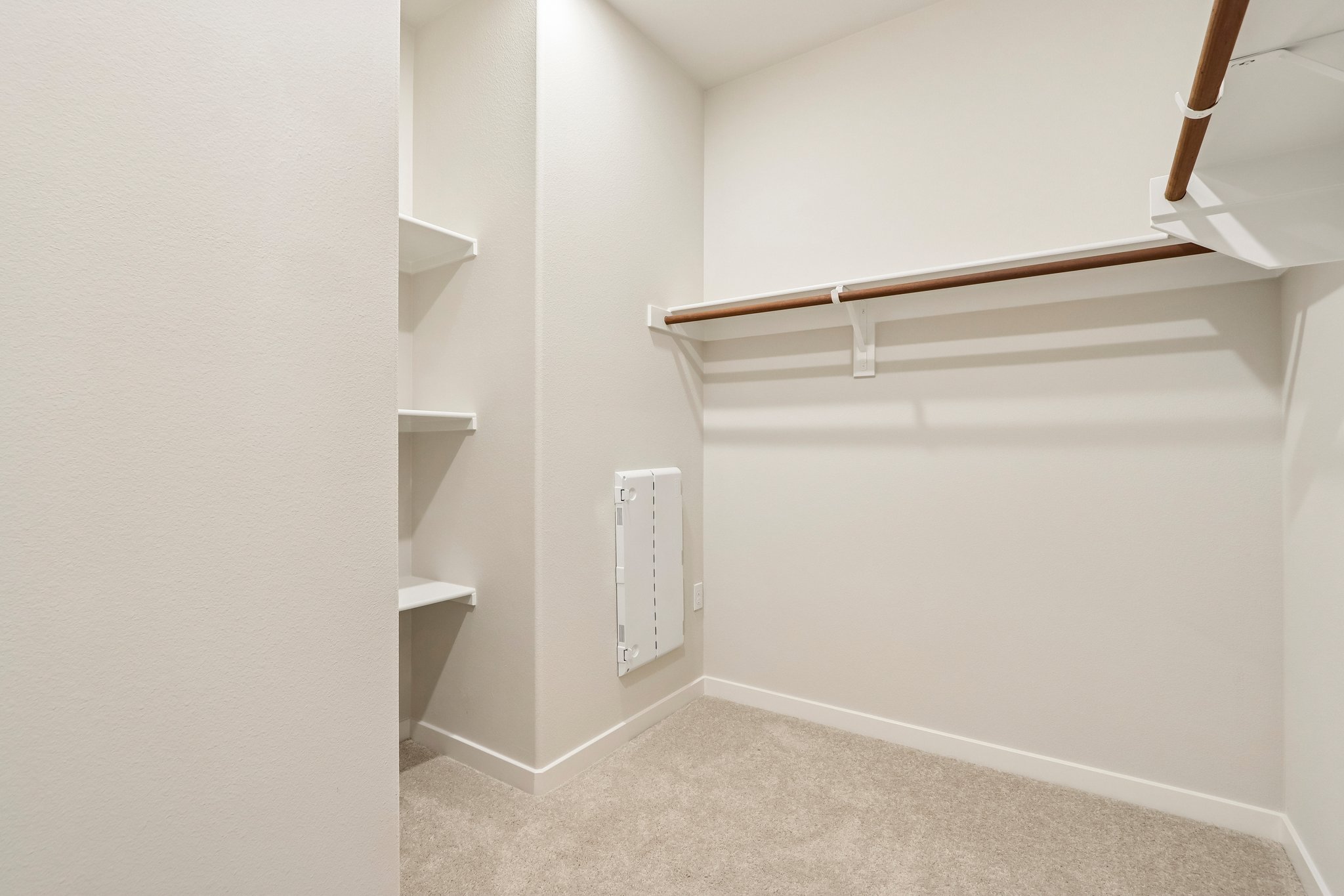 A white room with a white wall.