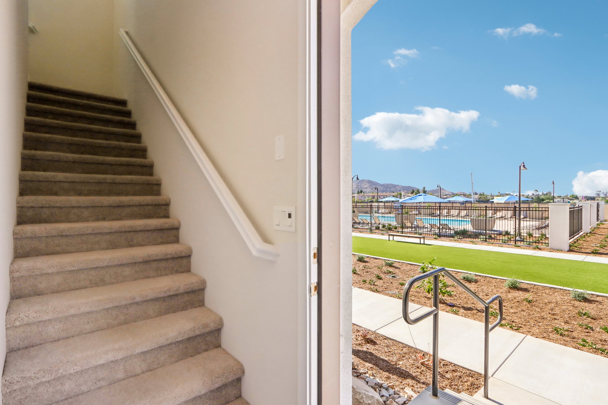A set of stairs leading up to a building.