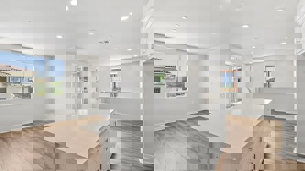 A large kitchen with a large island.