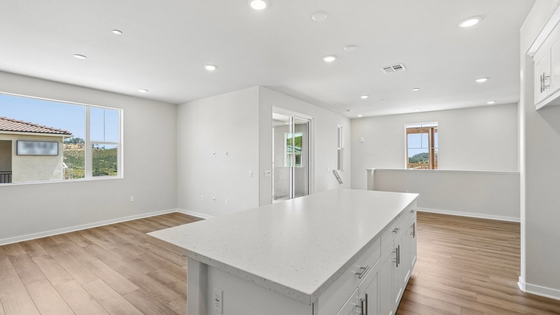 A large kitchen with a large island.