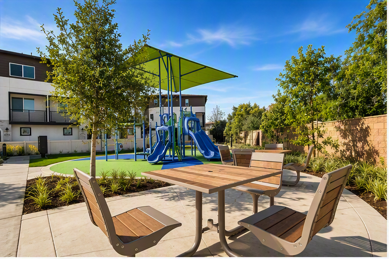 A patio with a table and chairs.