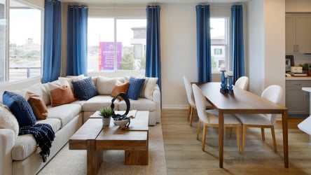 A living room with a couch and a coffee table.