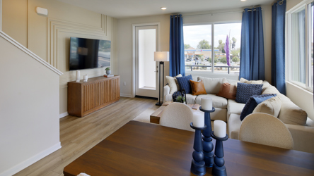 A living room with a large window.