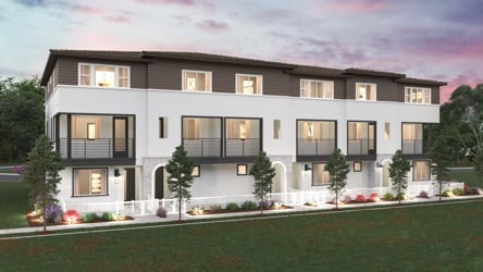 A building with a lawn in front.