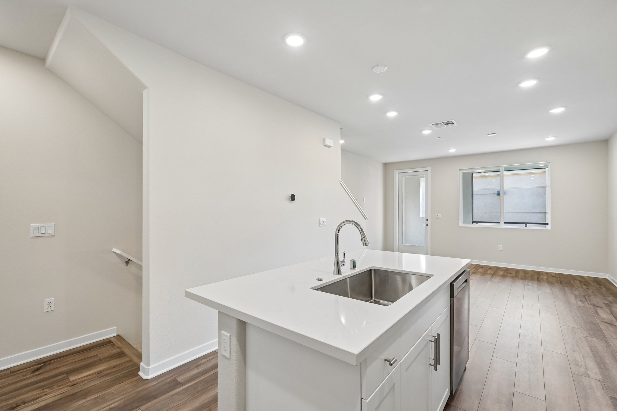 A bathroom with a sink and a tub.