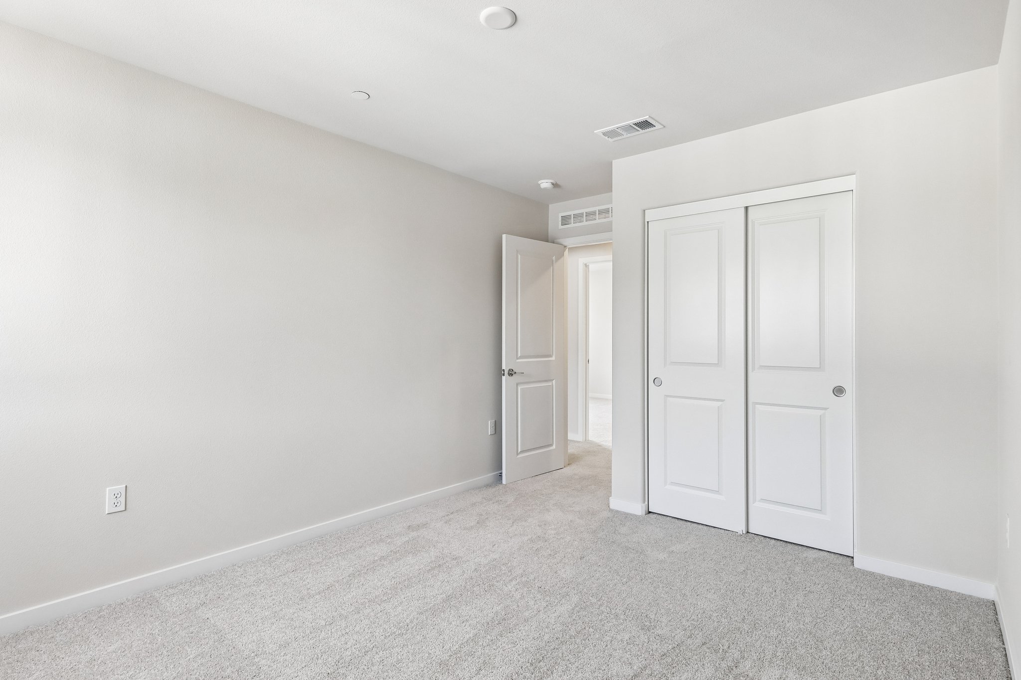 A room with white doors.
