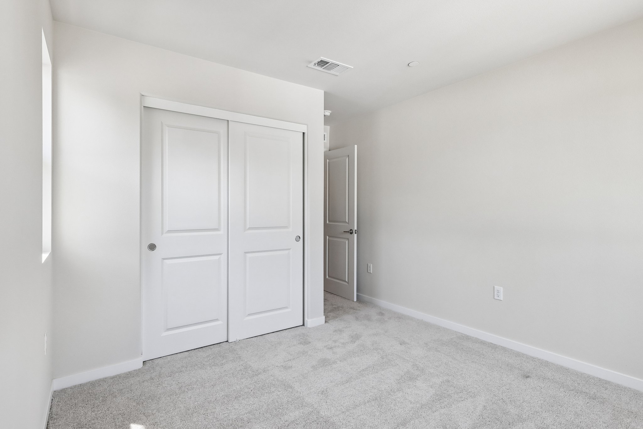 A room with white doors.