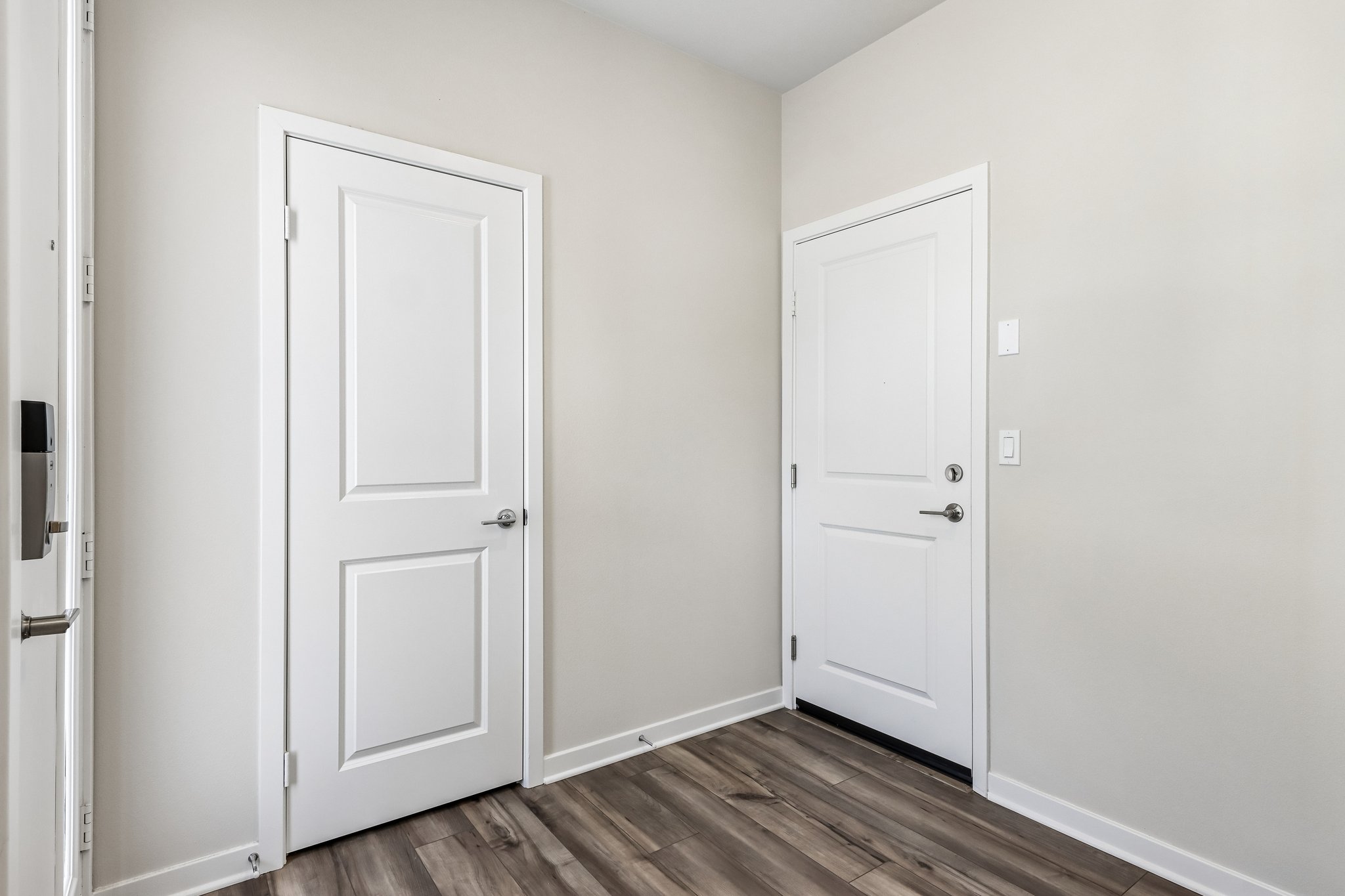 A room with white doors.