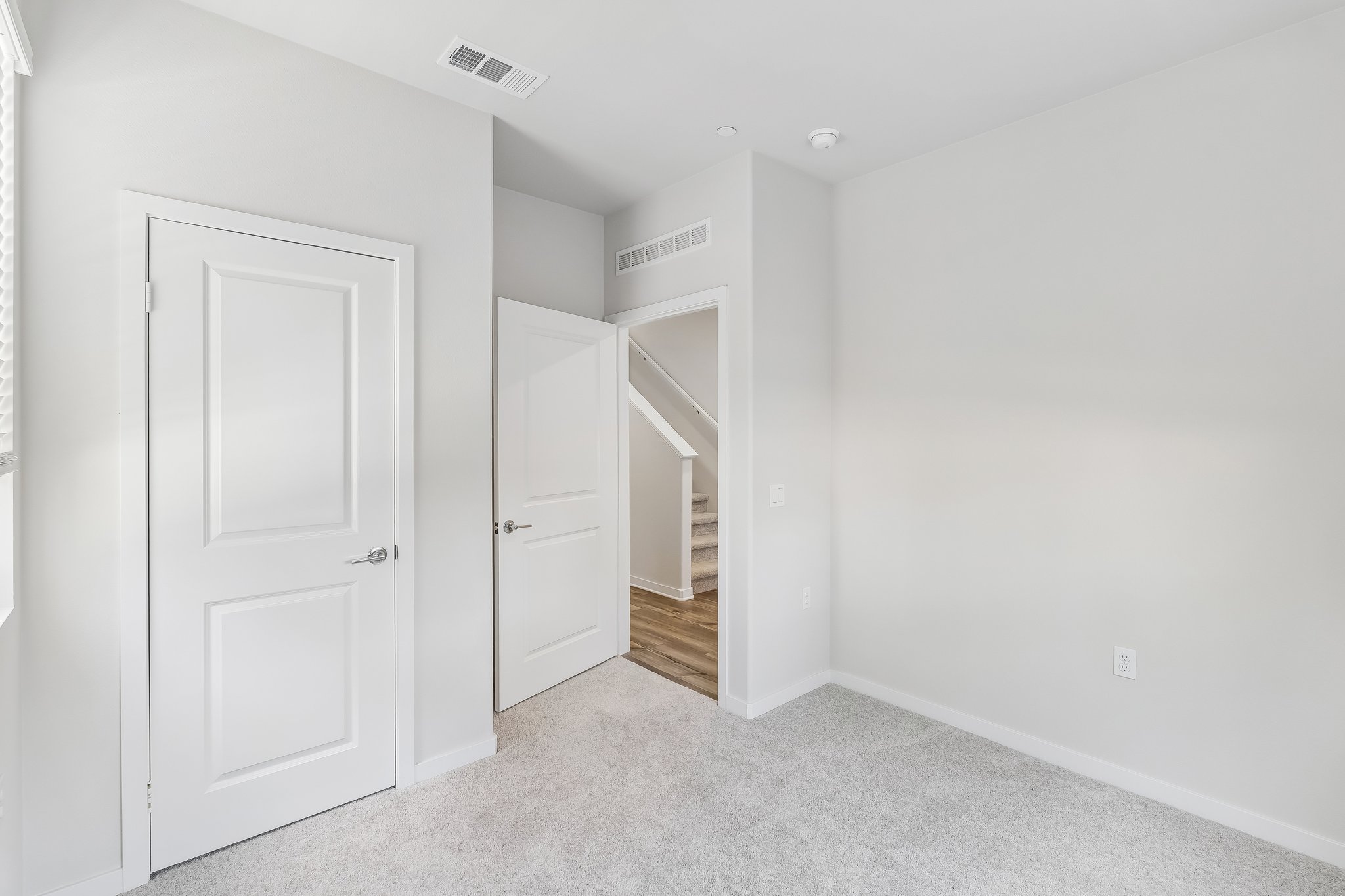 A room with white doors.