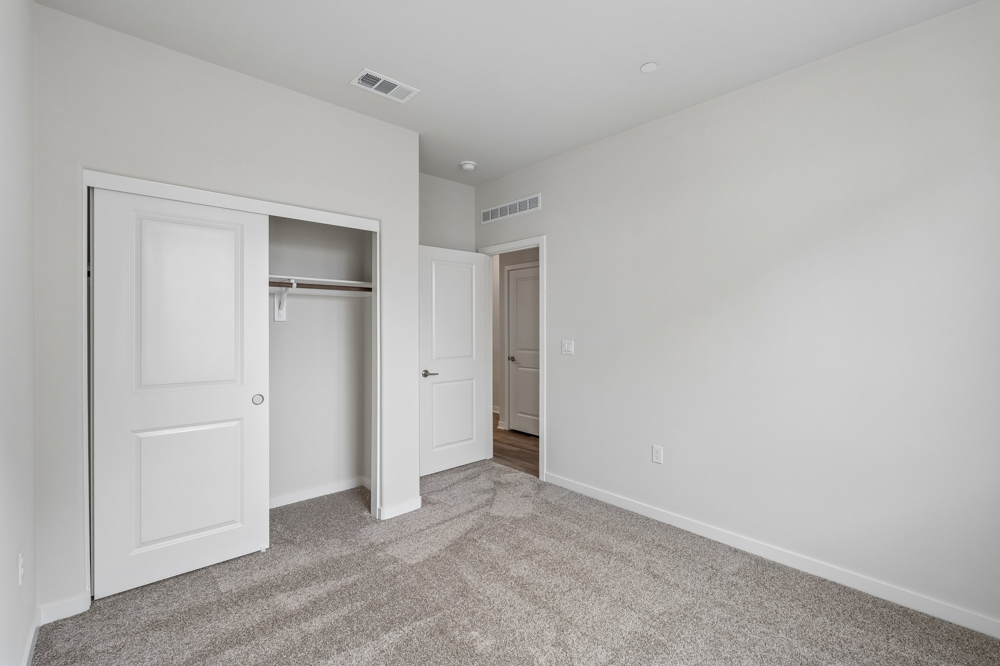 A room with white doors.