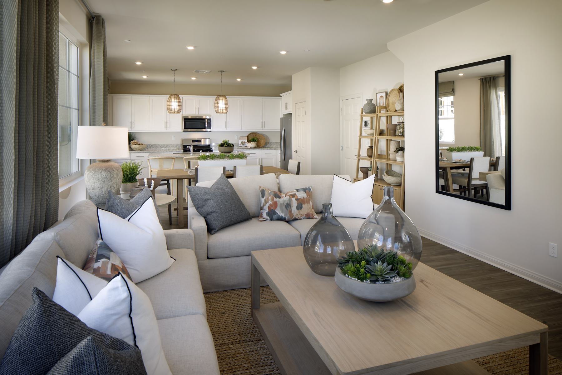 A living room with a couch and a table.