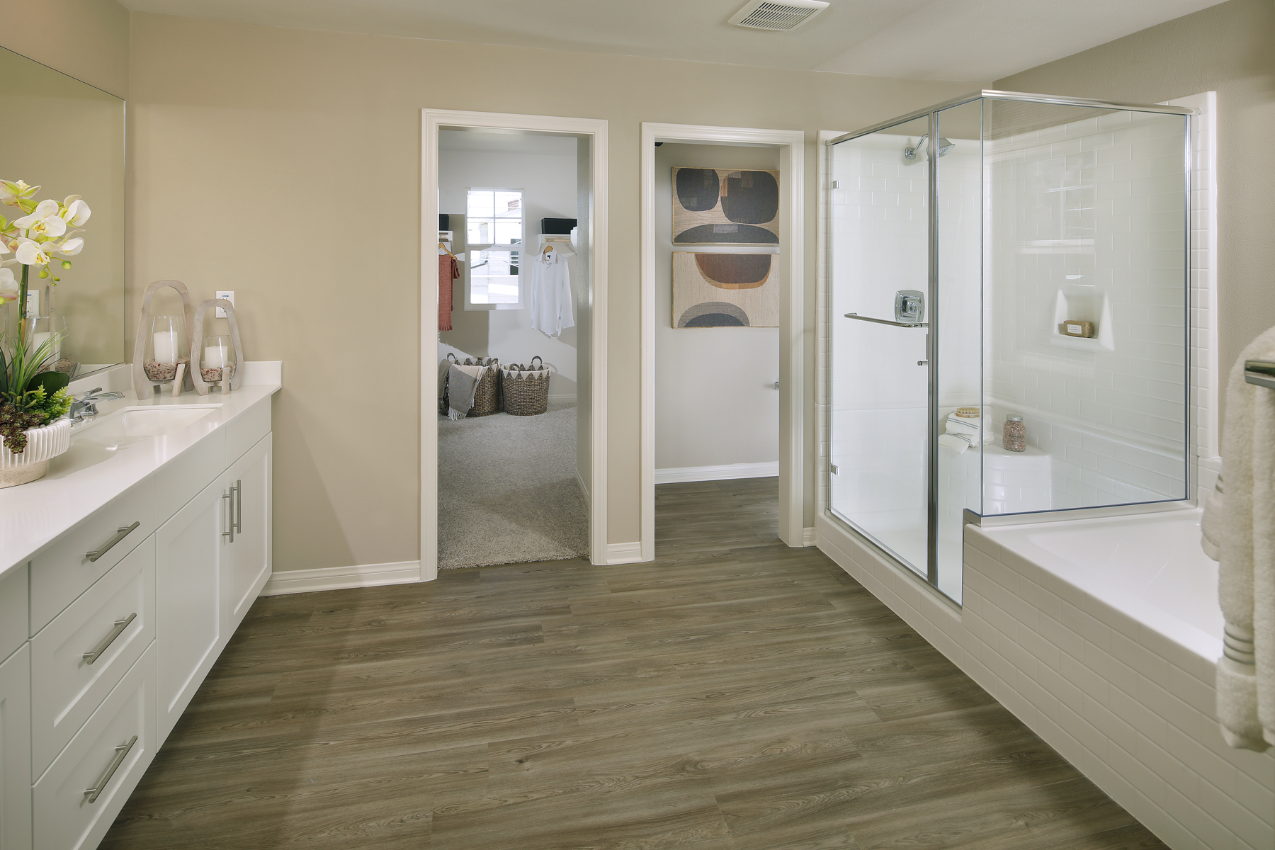 A bathroom with a glass shower.