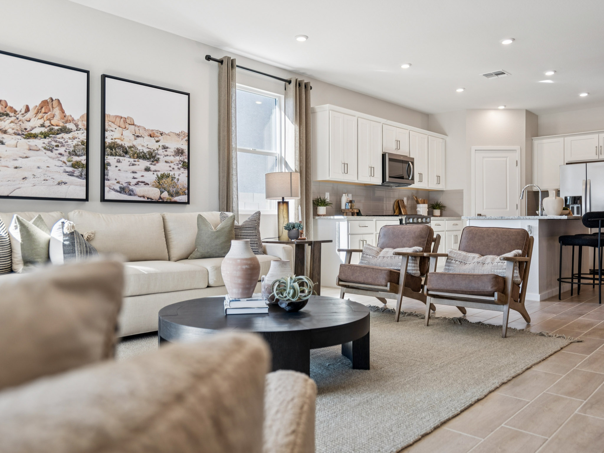 A living room with a couch and a table.