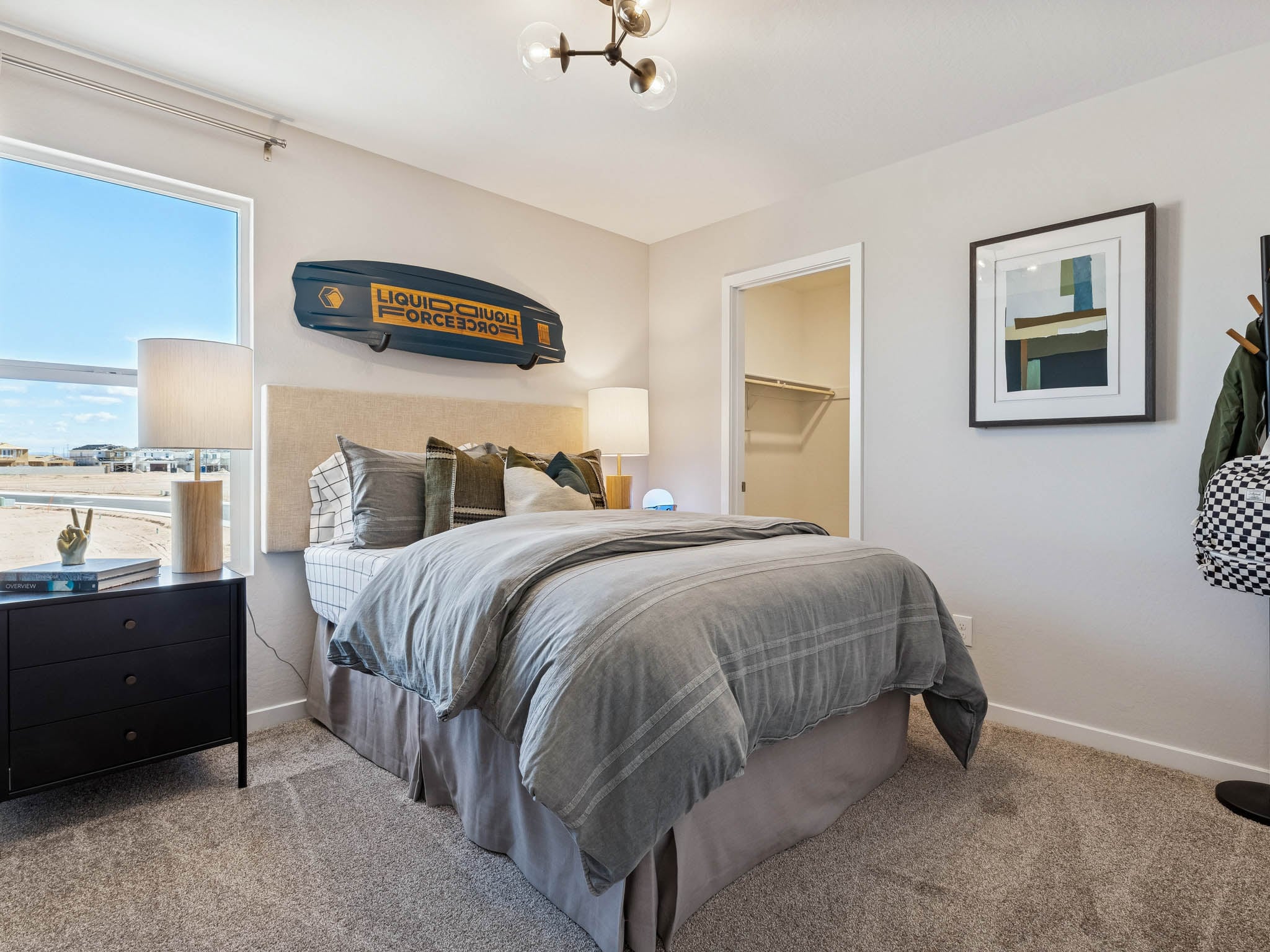 A bedroom with a large bed.