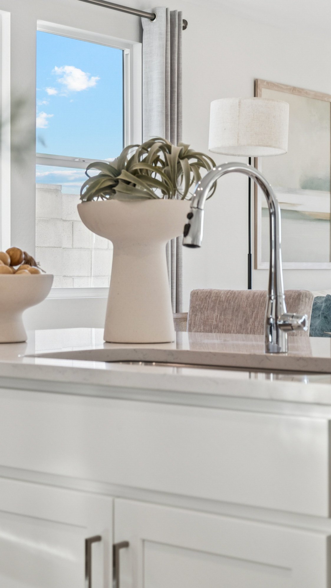 Geneva Model Home in the Foothills Collection at Rancho Vista in Surprise AZ, with stunning view of white tank mountains from backyard, community amenities, & located off of Sun Valley Parkway in Surprise AZ 10 minutes from US-60 & Loop 303