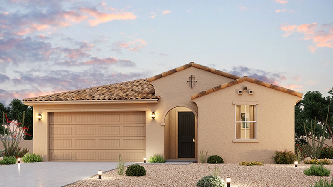 A house with a stone driveway.