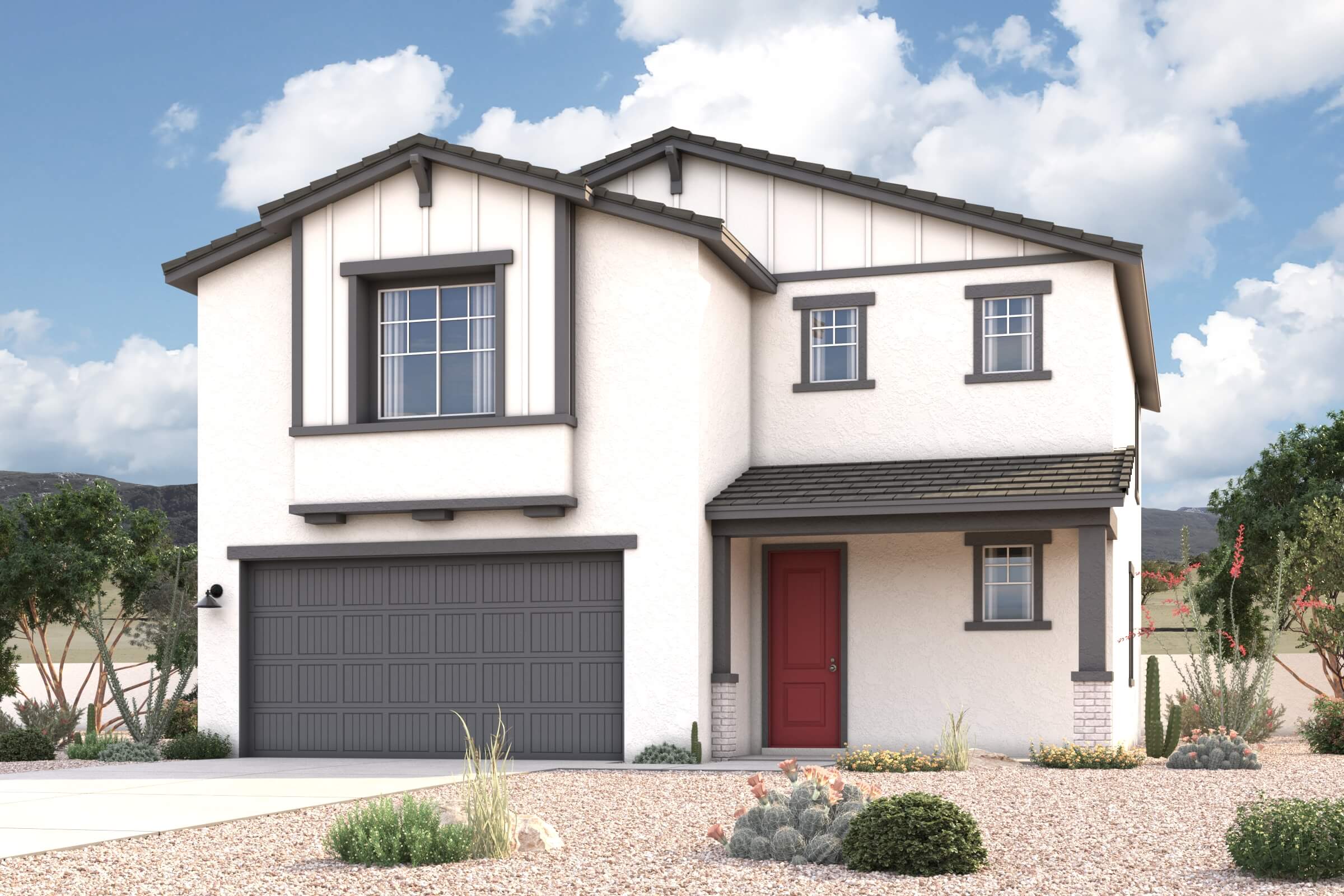 A white house with a garage.