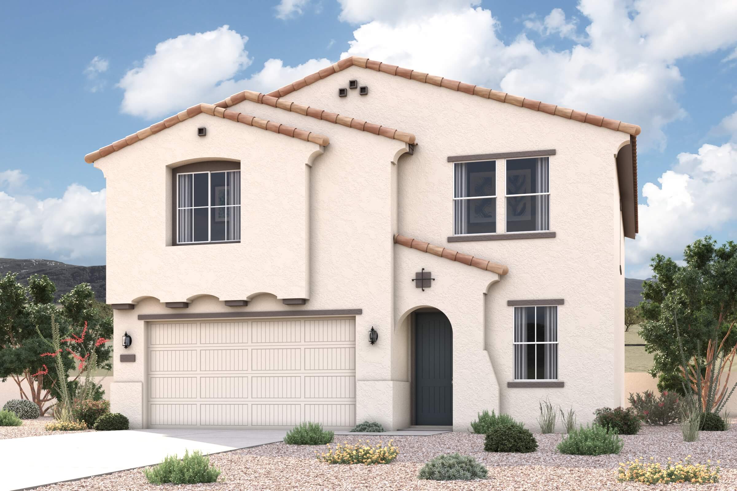 A white house with a garage.