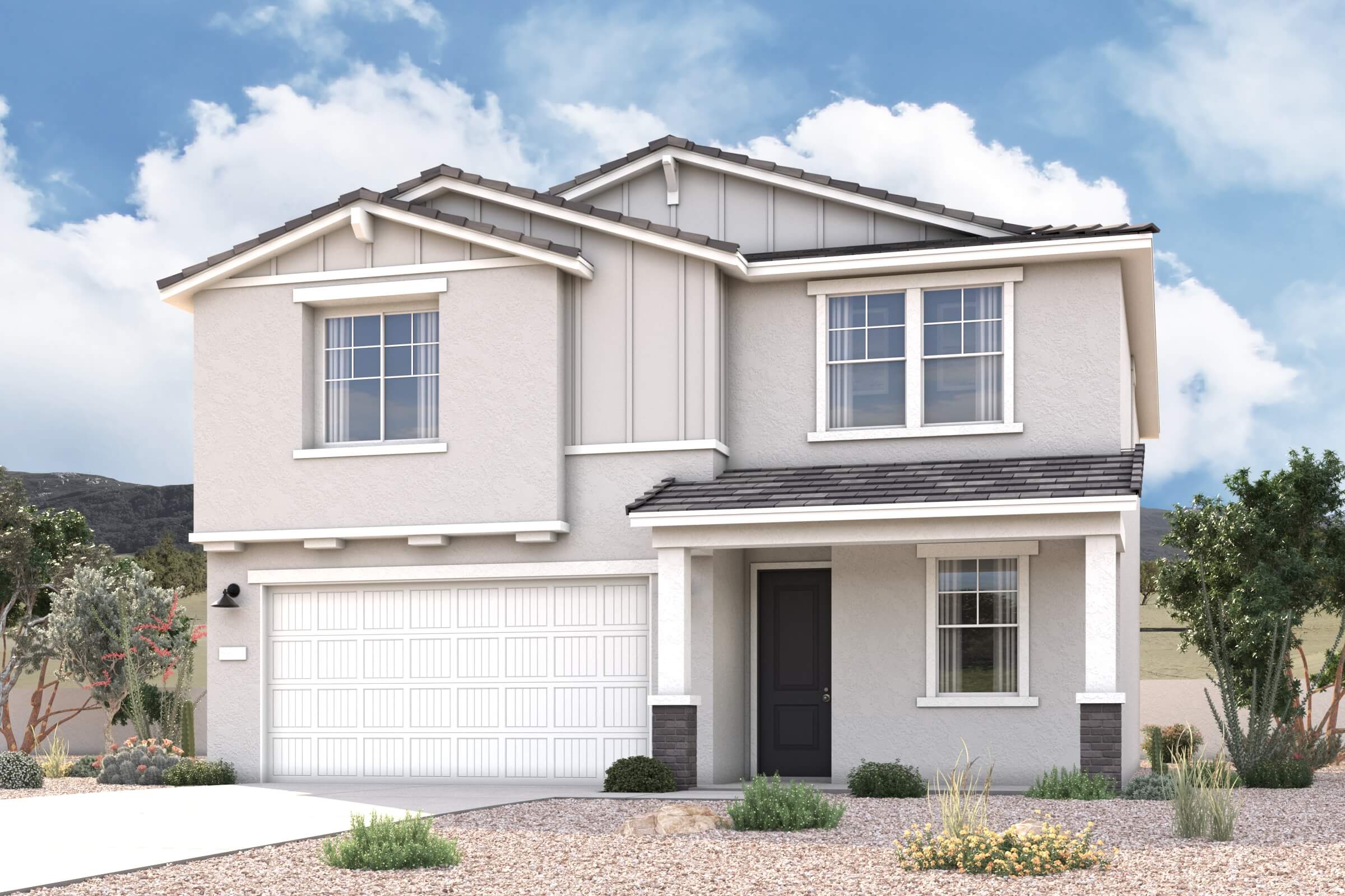 A white house with a garage.