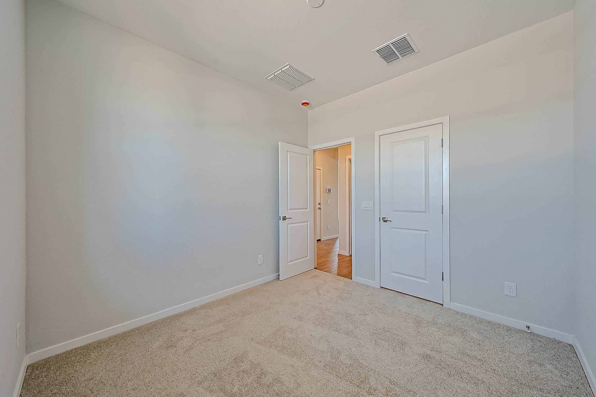 A room with white doors.