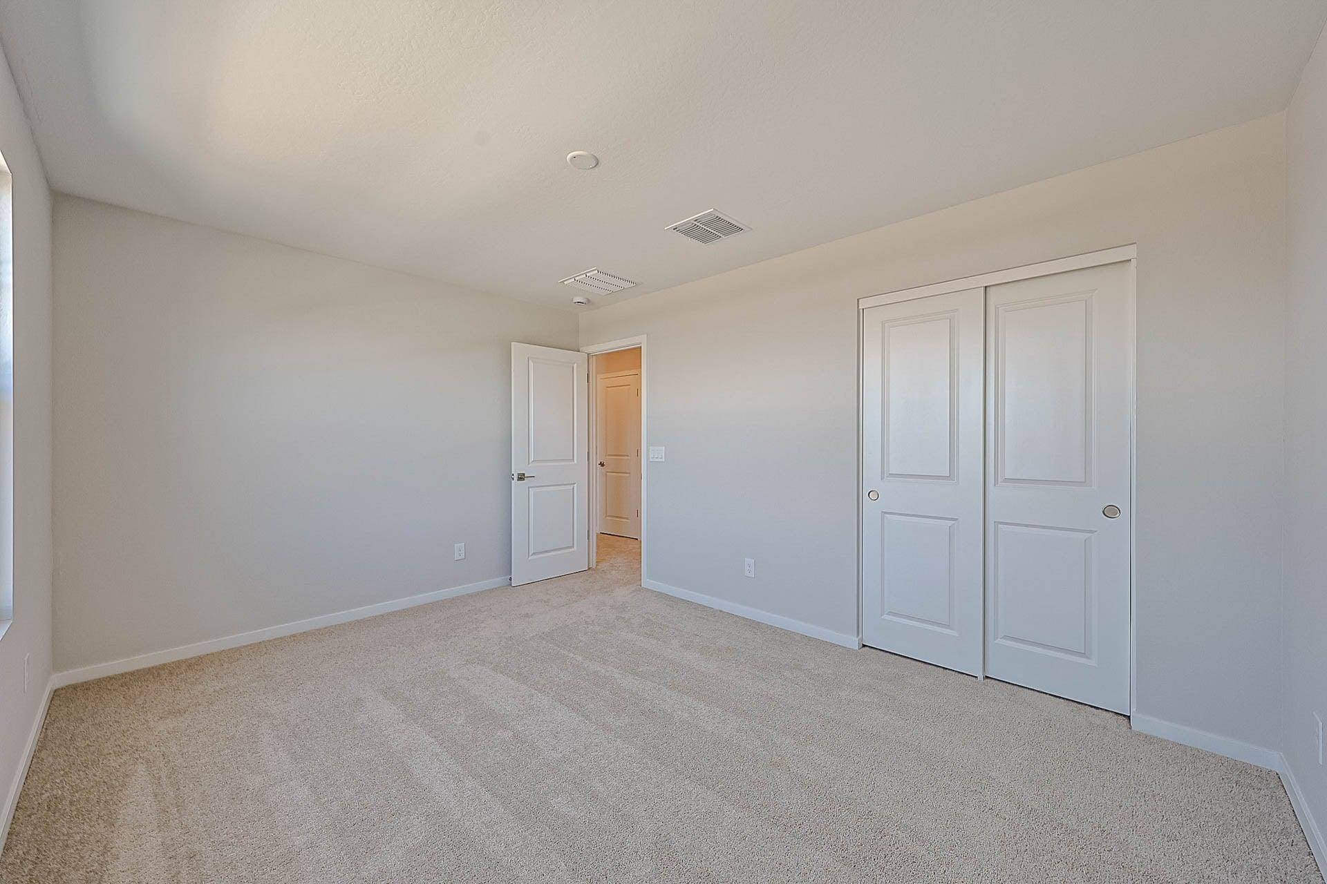 A room with white doors.