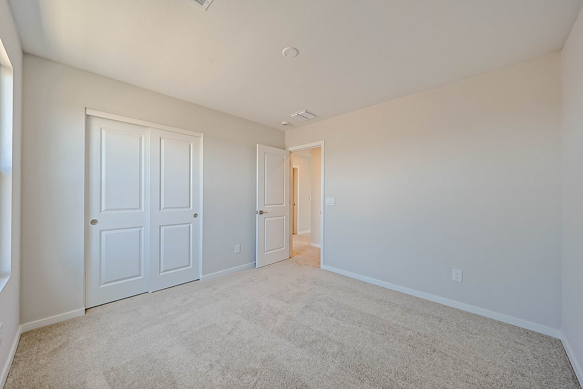 A room with white doors.