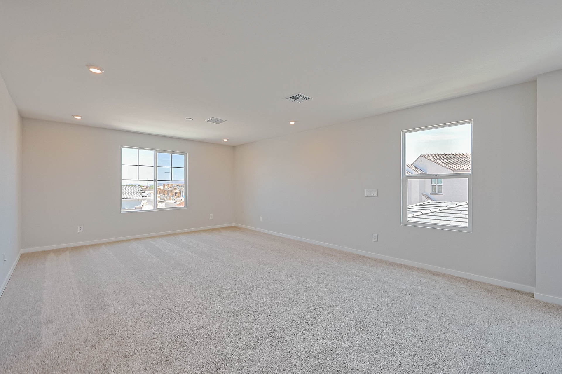 A room with a few windows.