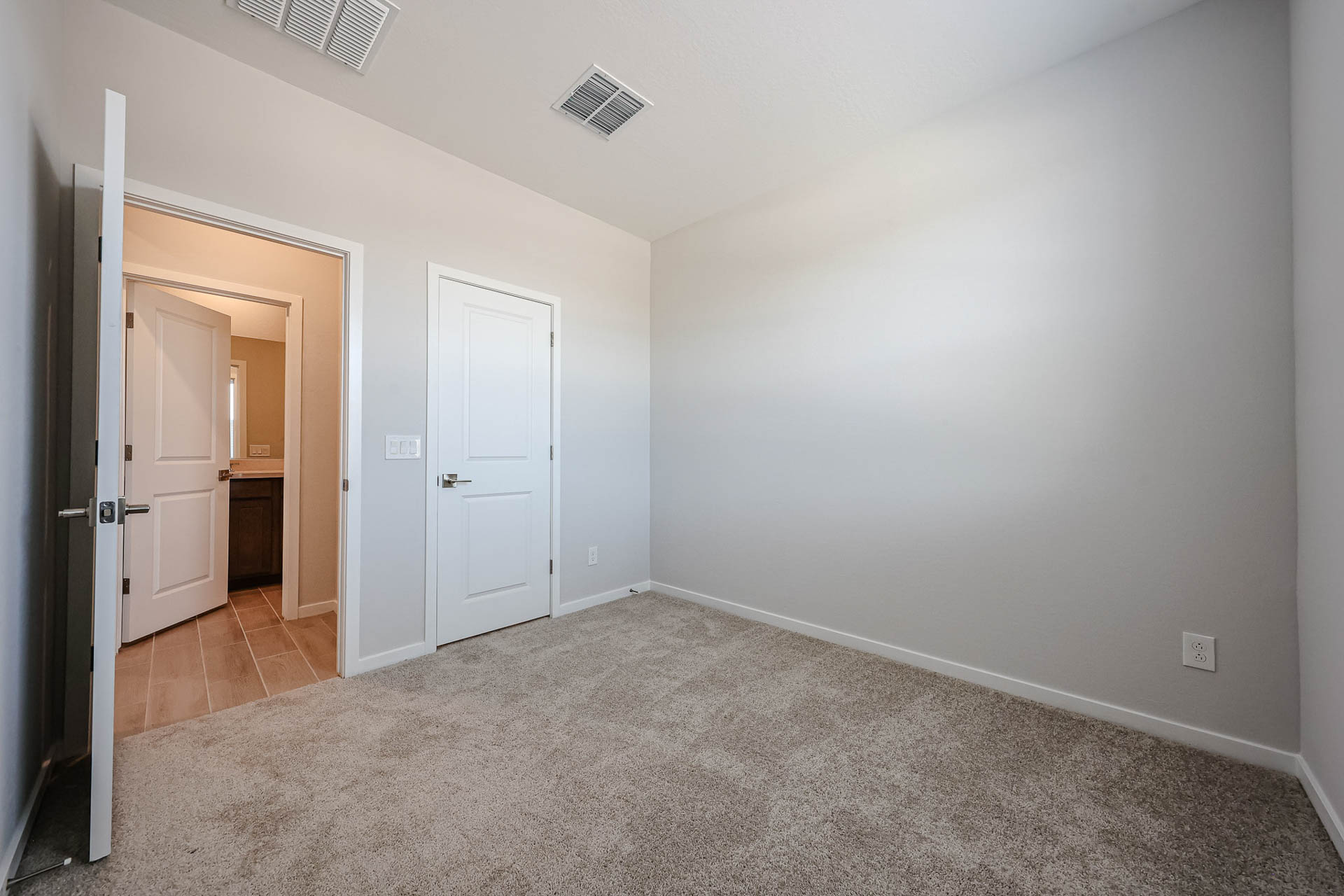 A room with white doors.