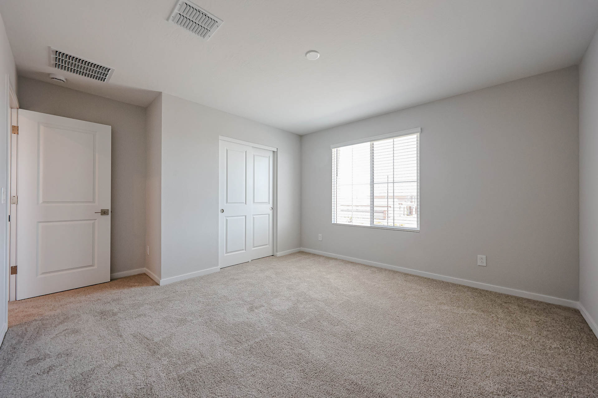 A room with white doors.