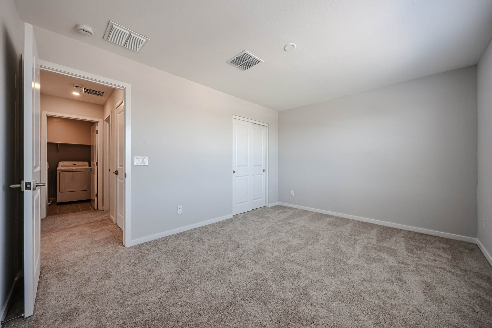 A room with white doors.
